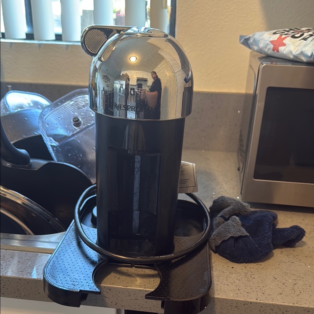 Nespresso Black and Silver Coffee Maker
